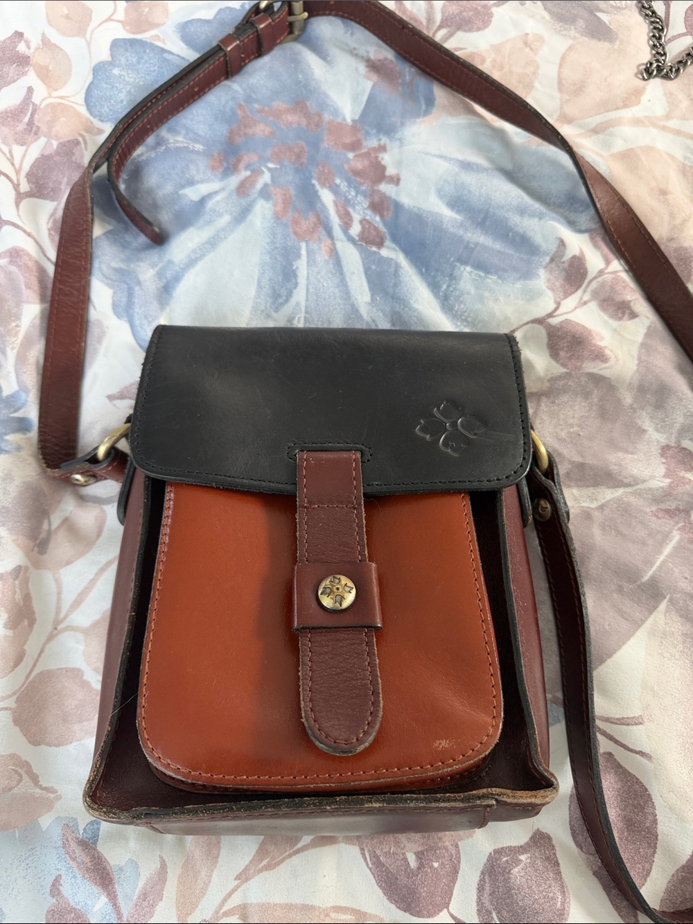 Patricia Nash Two-Tone Leather Crossbody in Black and Rust